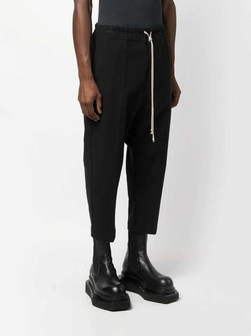 RICK OWENS DROP-CROTCH CROPPED TROUSERS