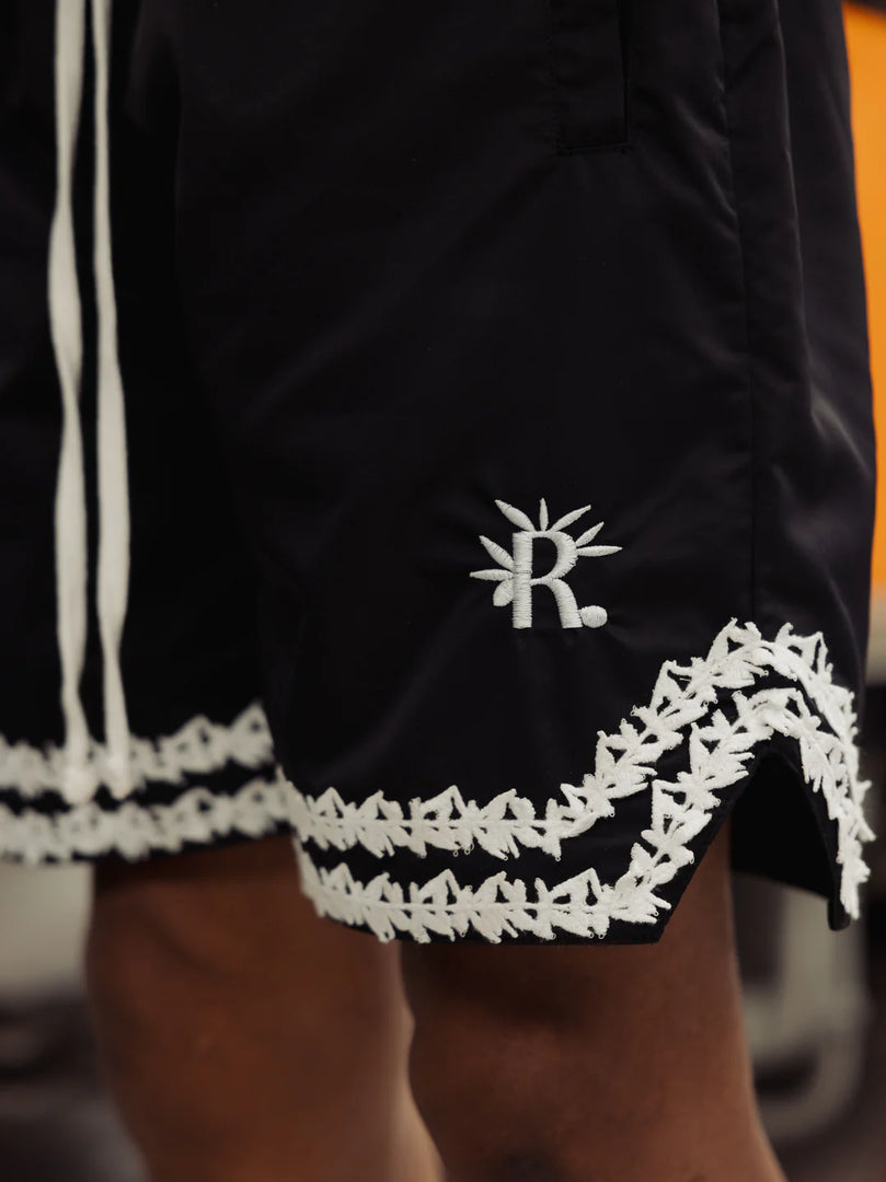 ROUGH SHORTS WITH KNITTED OLIVES