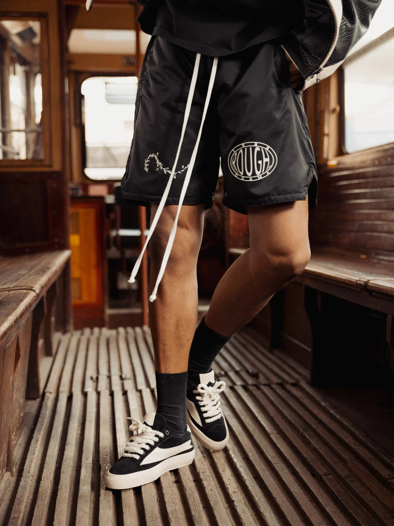 ROUGH SHORTS WITH KNITTED OLIVES